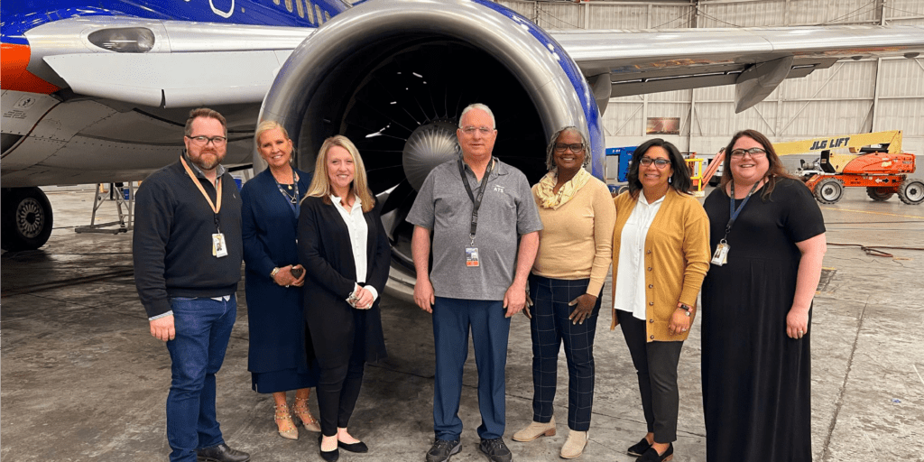Image of Missouri One Start and Metropolitan Community College with Aviation Tech Services workers.